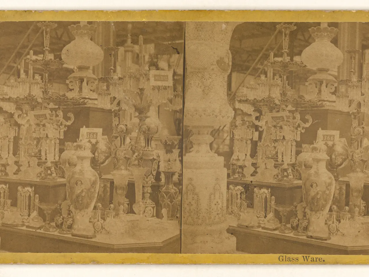 The image shows an old photo of a room filled with lots of vases and other decorative items on the...