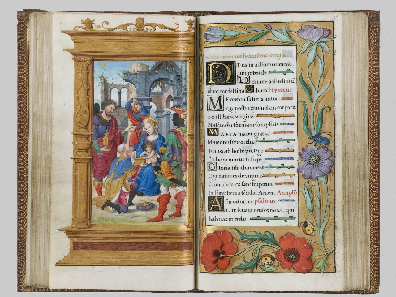 The image shows an open book with an illuminated manuscript featuring a painting of a group of...