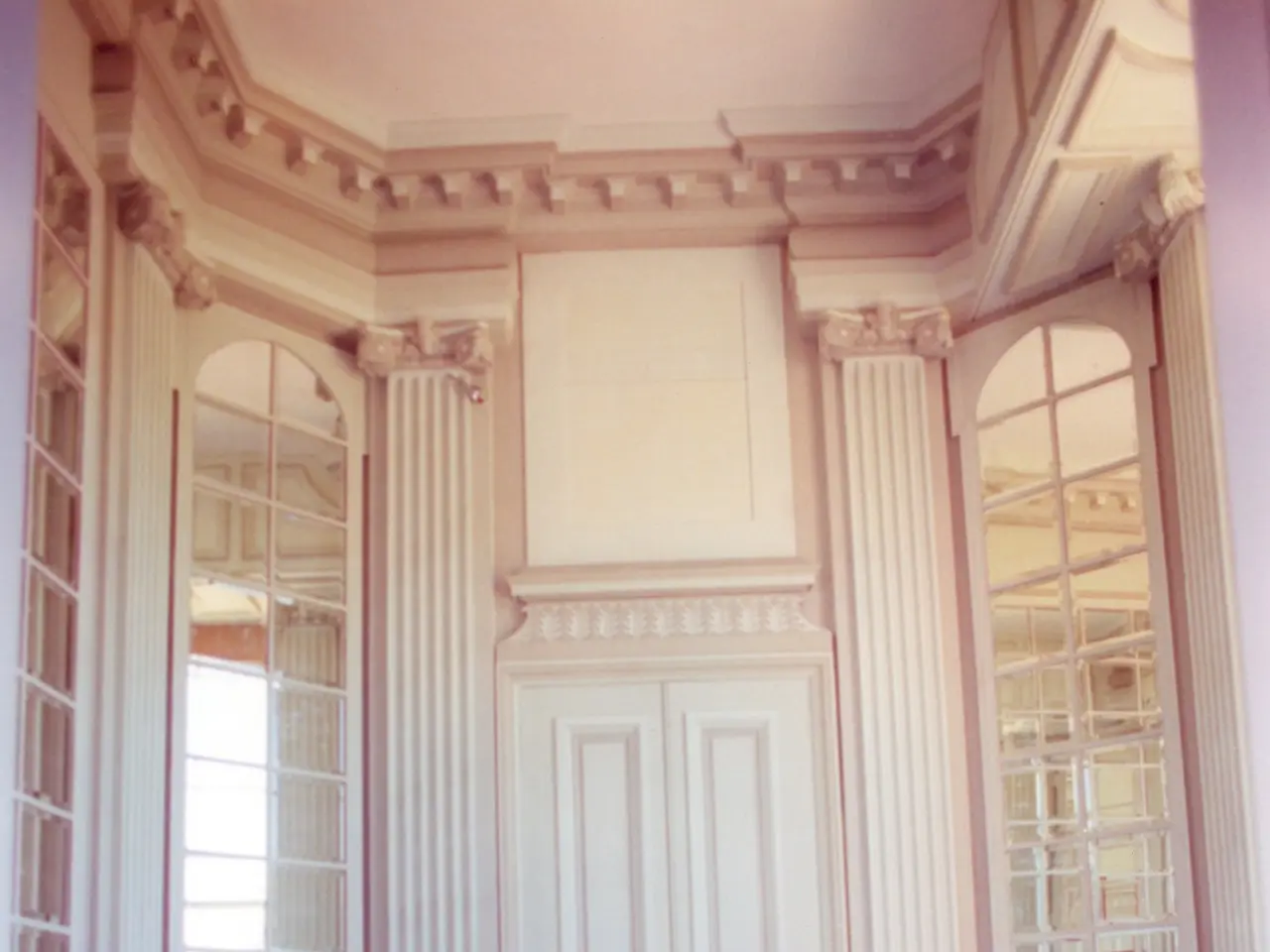 The image shows a bathroom with a large bathtub on the right side, a toilet seat on the left side,...