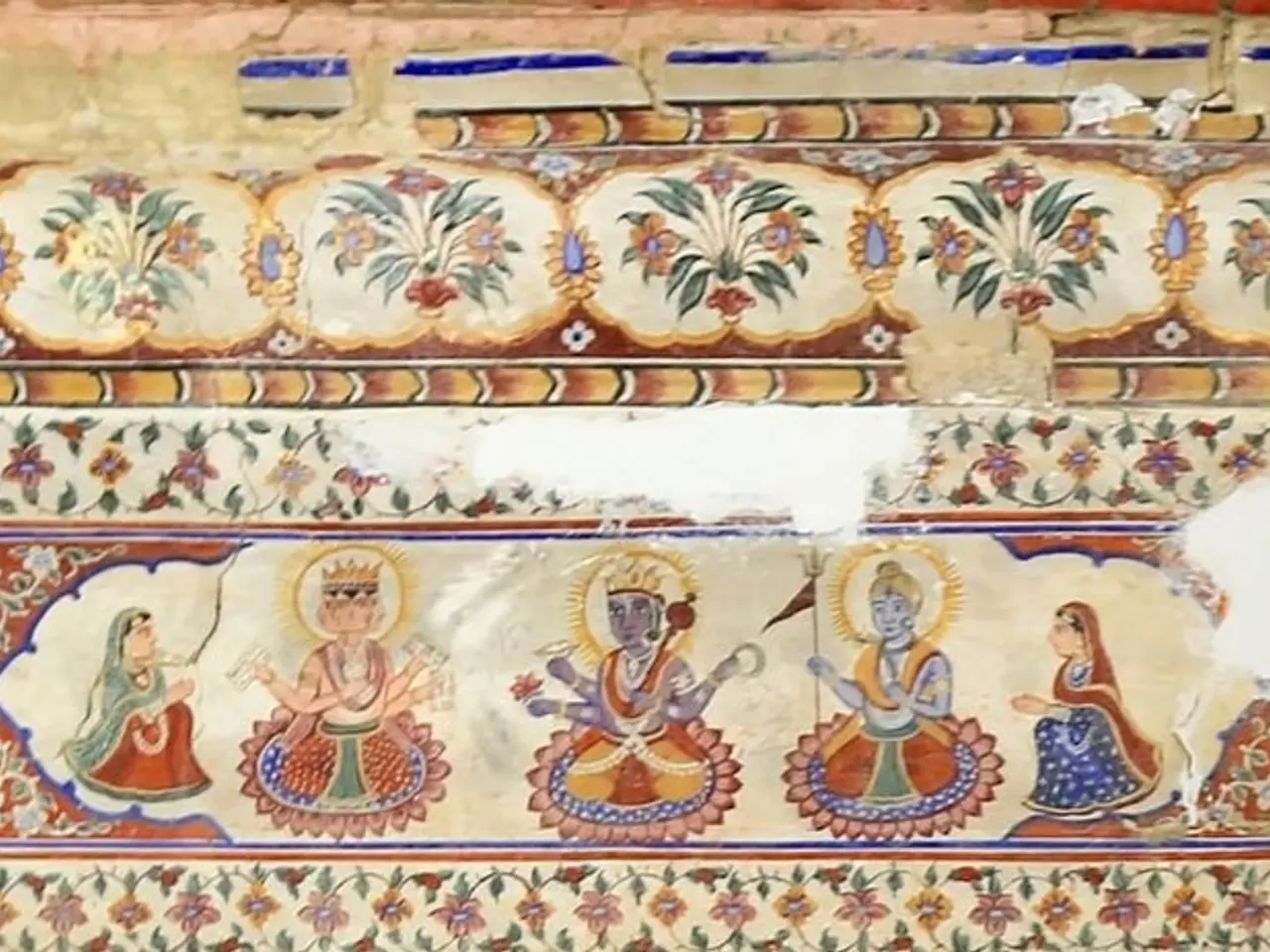 The image shows a painting on the wall of a building in Rajasthan, India, depicting a scene from a...