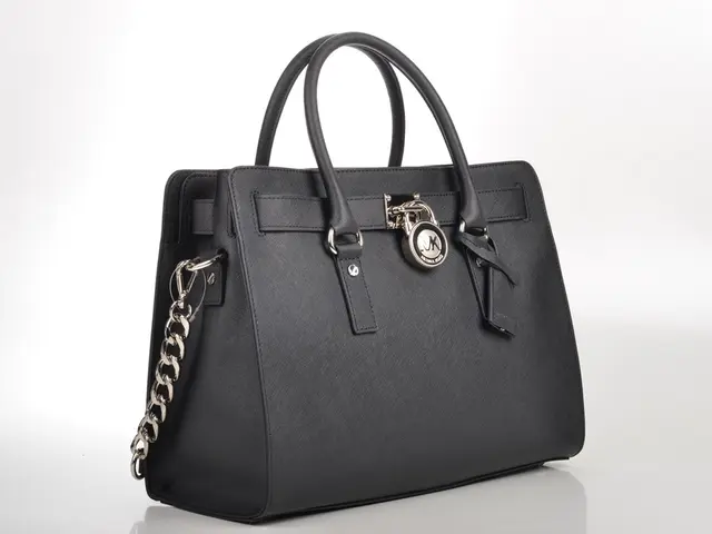 High-street bags adorned with studs mirror Sonia Rykiel's legendary domino bag, offering a...