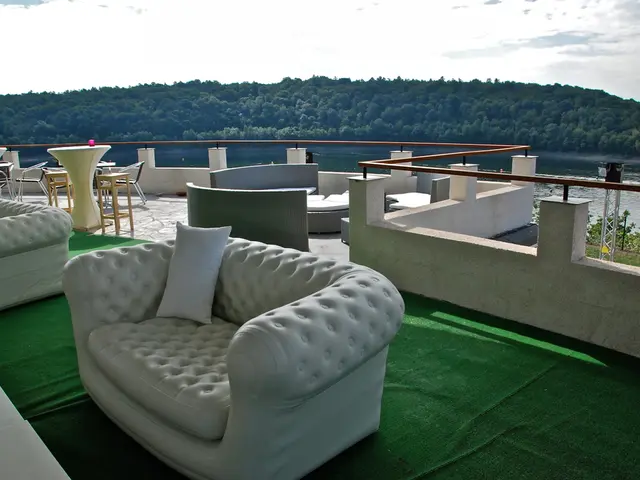 Ditch the conventional beige and grayscale - Cliff Richard's deep green couch demonstrates how this...