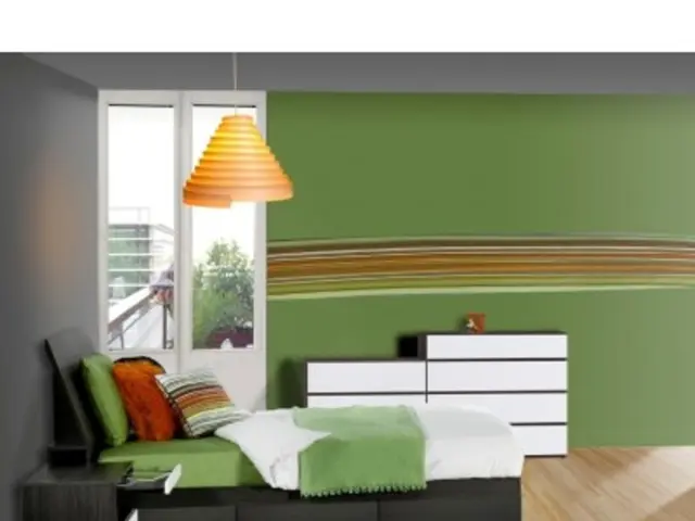 This picture is clicked inside the room. At the bottom of the picture, we see the wooden floor and...