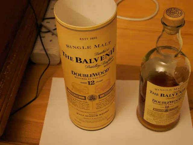 In the image we can see there is a wine bottle and its box.