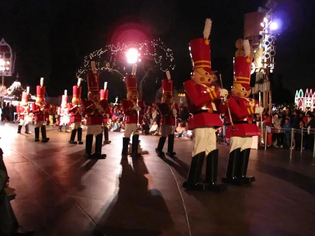 In the middle of the picture, we see the people wearing the red and white costumes are standing....