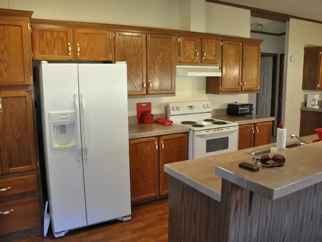 In this image I can see the fridge, stove, oven, sink, tap and few objects on the countertop. I can...