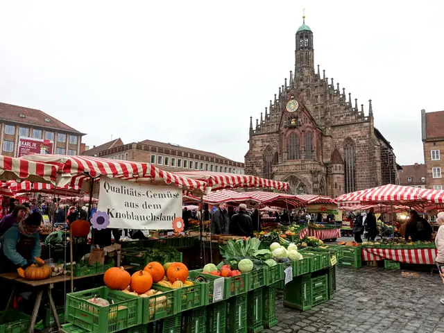 The image shows a bustling market in Nuremberg, Germany, with a variety of fruits and vegetables on...