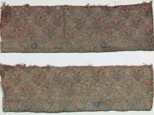 The image shows a pair of embroidered rugs with a floral design on a white background. The rugs...