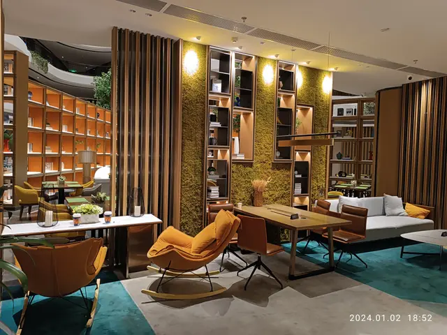 The image shows a living room filled with furniture such as chairs, tables, sofas, pillows,...