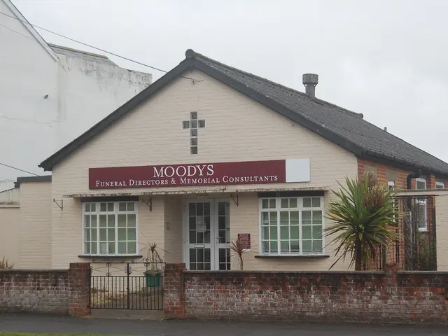 The image shows Moody's Funeral Directors & Memorial Consultants, a house with windows and a door,...