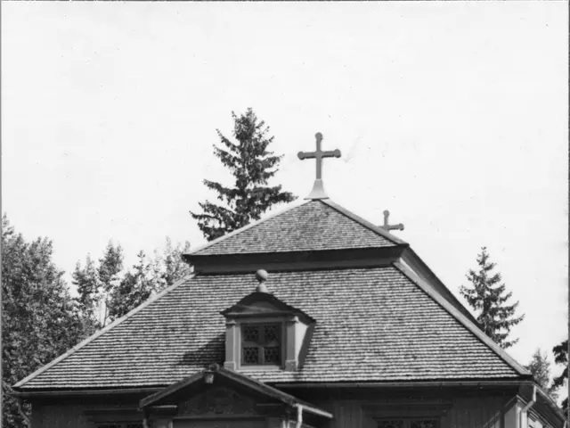 The image shows a small house with a door, windows, and a cross on the roof, surrounded by plants...
