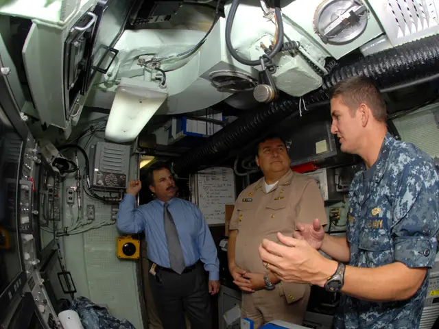 The image shows three men in military uniforms talking to each other inside a space station. On the...