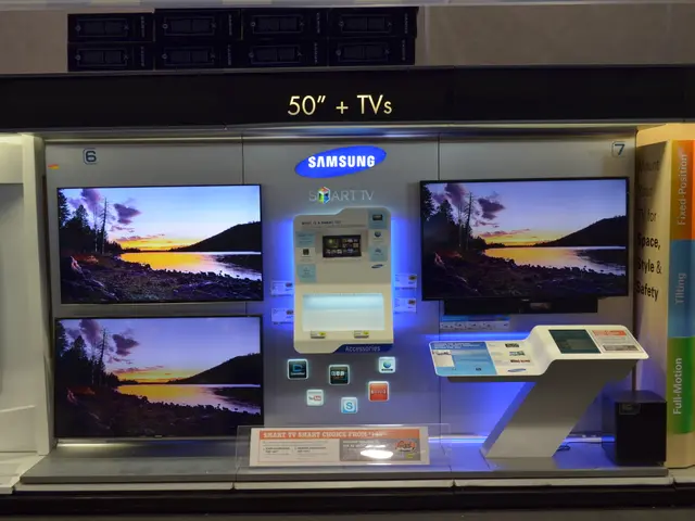 The image shows a store with a variety of televisions on display, including a Samsung Smart TV and...