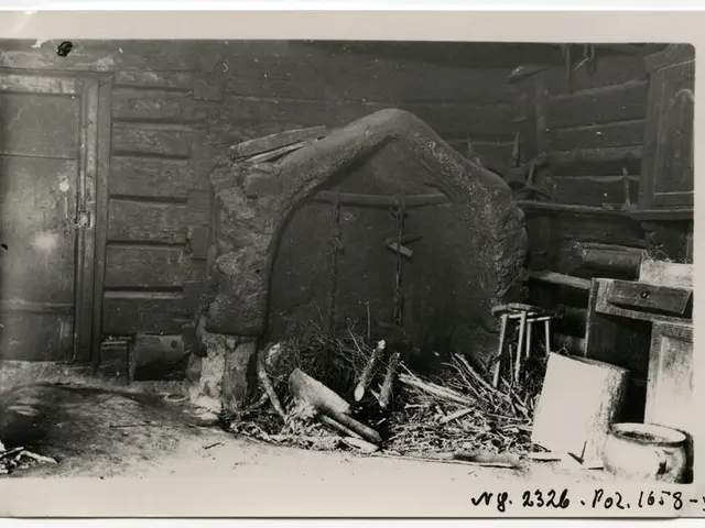The image shows an old black and white photo of a room with a stone fireplace, a door, a wall, and...