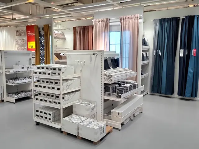 The image shows a room filled with lots of different types of furniture, including racks with boxes...