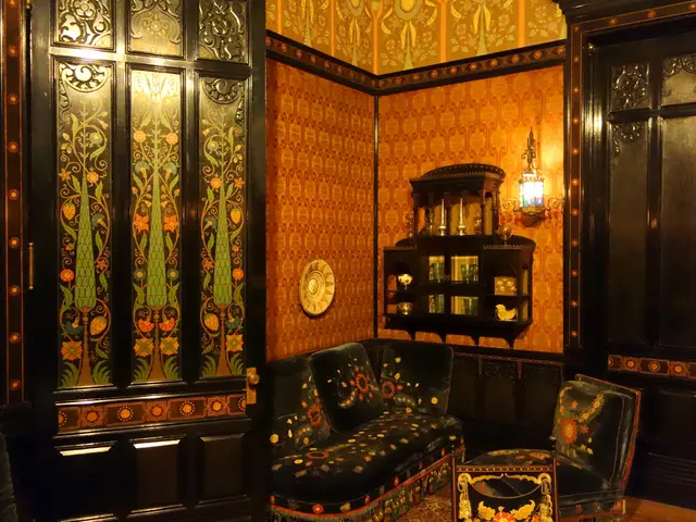 The image shows a living room with a sofa, chairs, a table, cupboards, a lamp, and various objects...