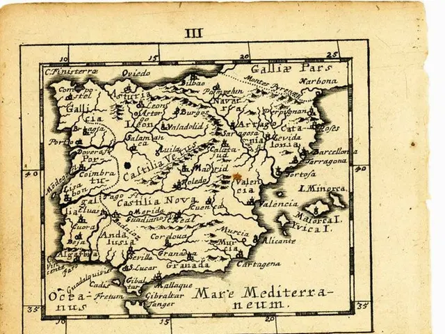 The image shows an old book with a map of Spain on it. The map is detailed and shows the various...