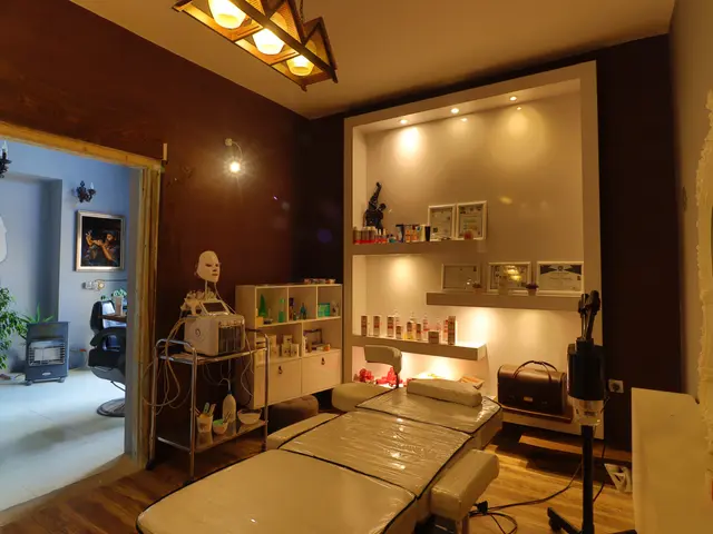 The image shows a room with a bed and a mirror on the wall, electric lights attached to the roof,...