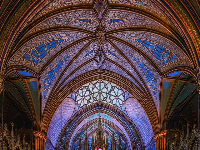 The image shows the interior of the Basilica of Notre Dame in Paris, France. At the bottom of the...