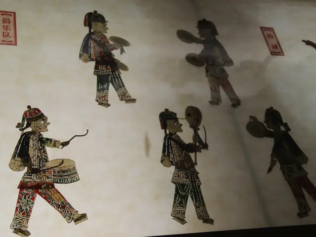 The image shows a book with a painting of a group of people playing musical instruments on it. The...