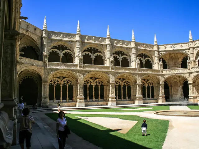The image shows the cloister of the Monastery of Santa Maria del Mar in Lisbon, Portugal. It is a...