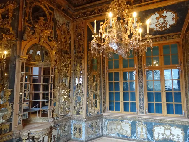 The image shows an ornate room with a chandelier hanging from the ceiling, candles with stands,...