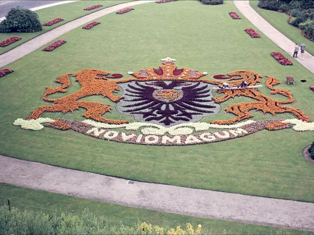 The image shows an aerial view of a flower garden in the middle of a park, with a logo in the...