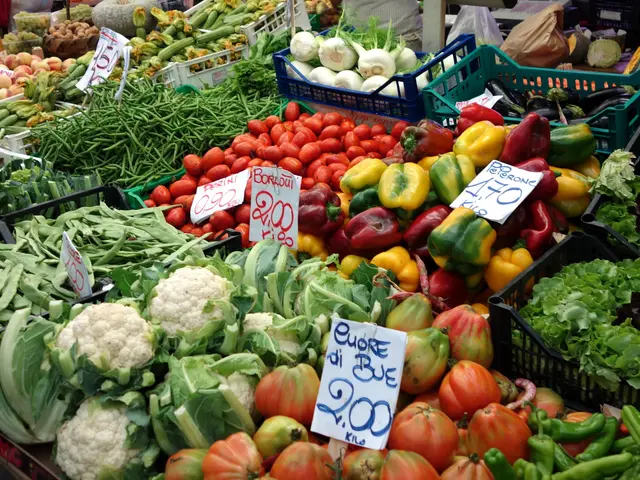 The image shows a bustling farmers market with a variety of vegetables on display, including...