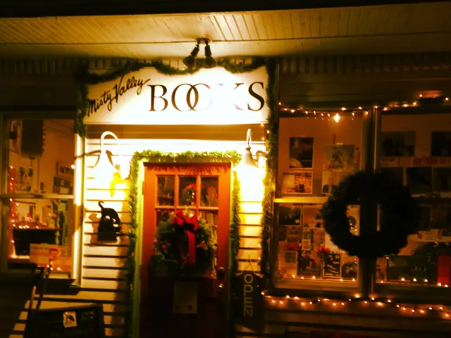 The image shows a store front at night with a wreath on the door, a board with some text on it,...