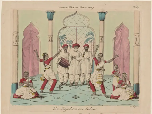 The image shows a group of people in traditional Indian clothing dancing on a stage, with some of...