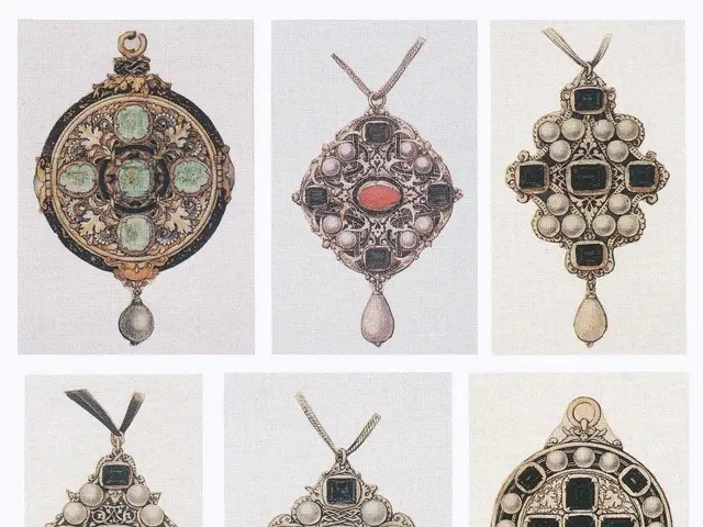 The image shows a page from a book with a variety of pendants, each with intricate designs and...
