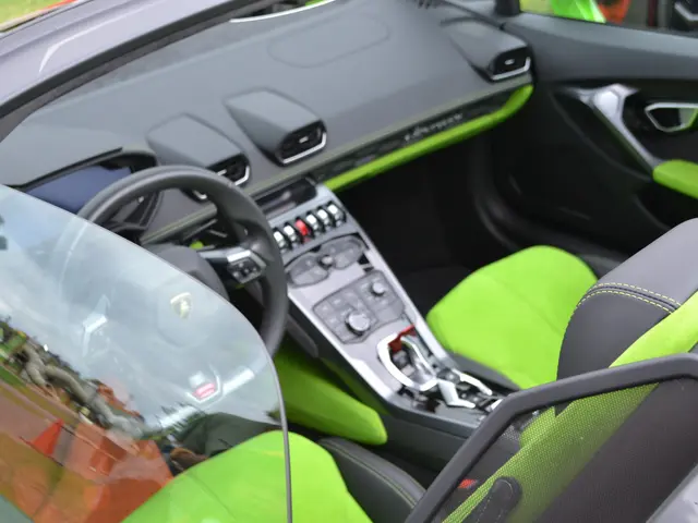 The image shows the interior of a Lamborghini Aventador LP700-4 Roadster, with its sleek black and...