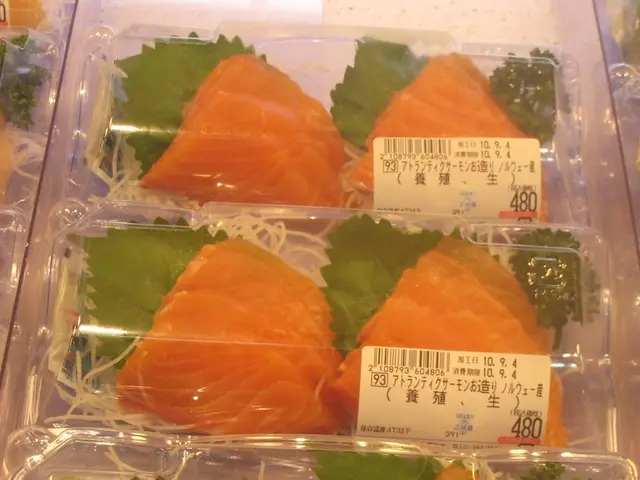 In this image we can see there are slices of fish packed in a plastic bag.