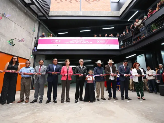 The image shows a group of people standing in front of a building, with some of them holding a pair...