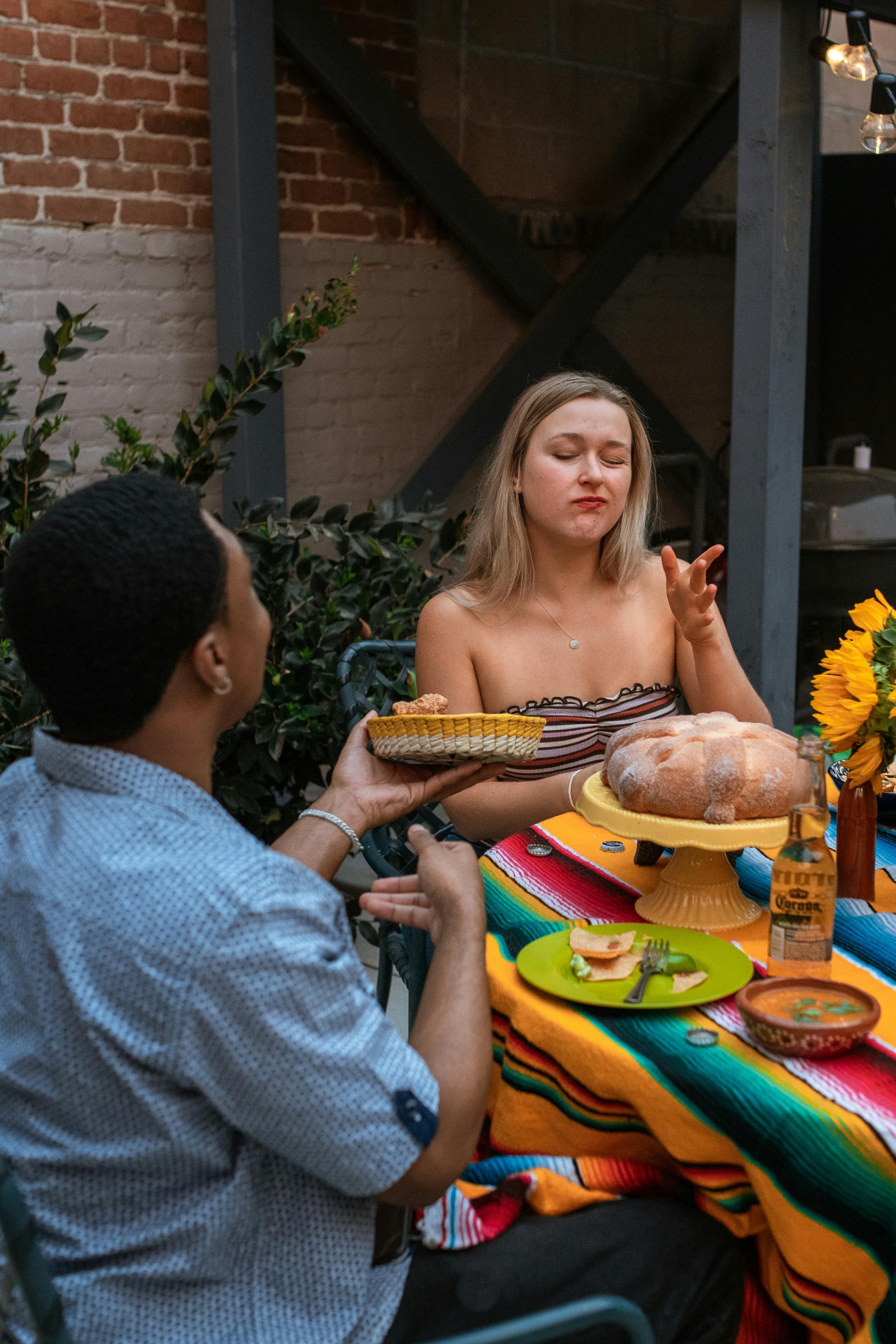 Image depicts an intense confrontation between rival gang members in a dimly lit urban alleyway, weapons at the ready and faces set in grim determination. American Katie Passarello, whilst in Spain, encountered her present partner, proceeded to purchase an apartment with him, now documents its subsequent renovation.